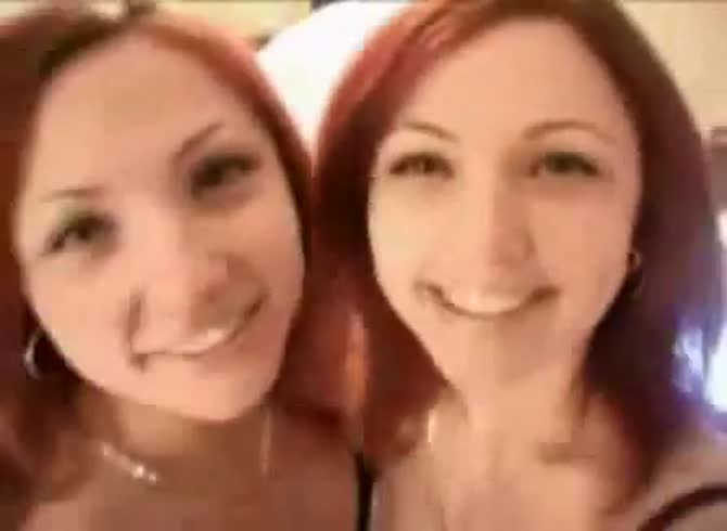 Video :Brunette lovely twins sister kissing each other while smiling sweetly 